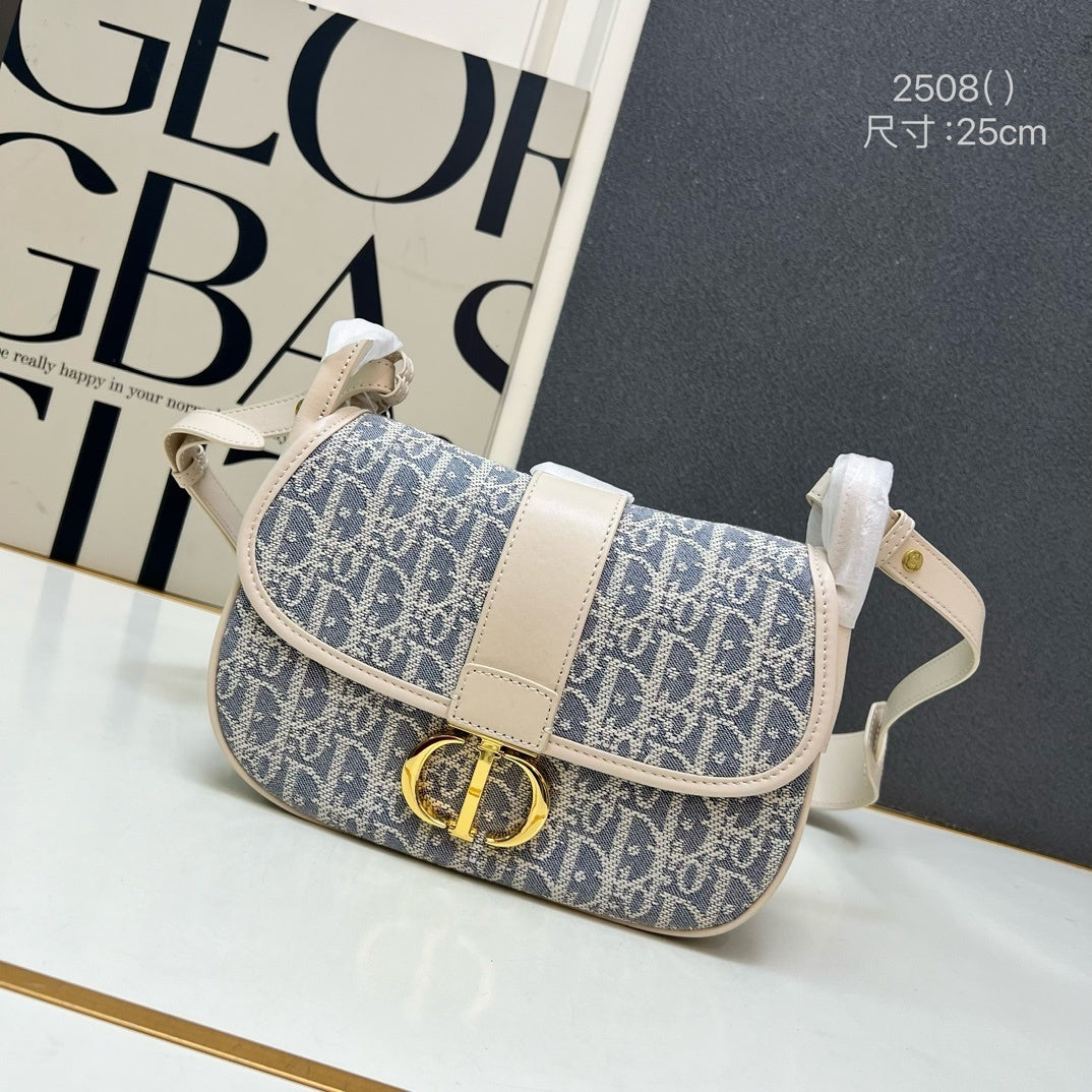 Christian  30 Montaigne Bag – Blue Oblique Jacquard Canvas with Gold-Finish CD Clasp
