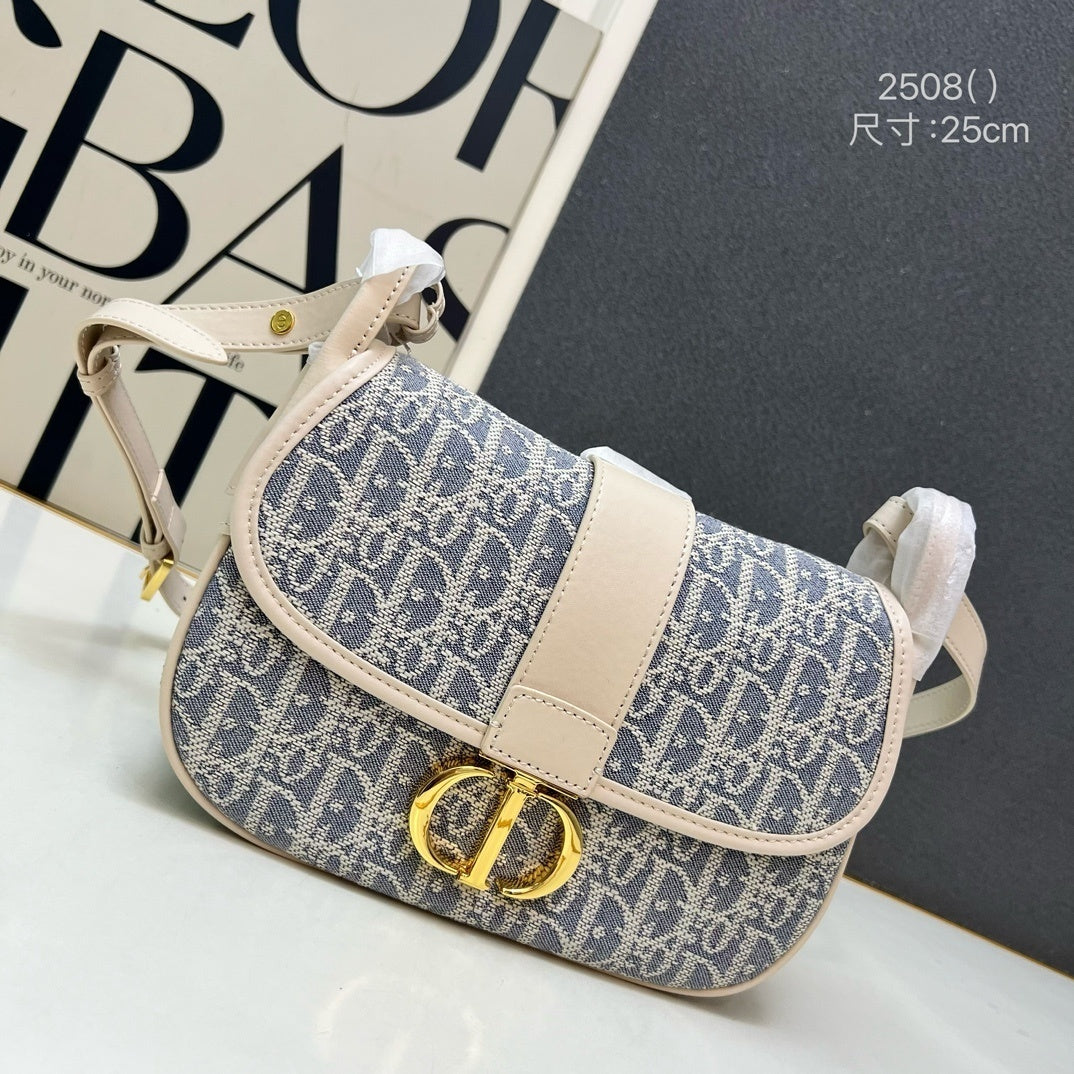 Christian  30 Montaigne Bag – Blue Oblique Jacquard Canvas with Gold-Finish CD Clasp