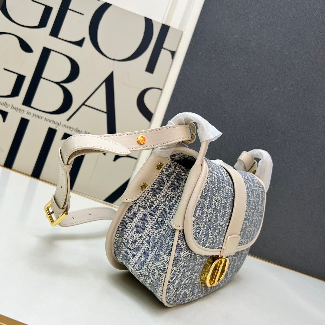 Christian  30 Montaigne Bag – Blue Oblique Jacquard Canvas with Gold-Finish CD Clasp