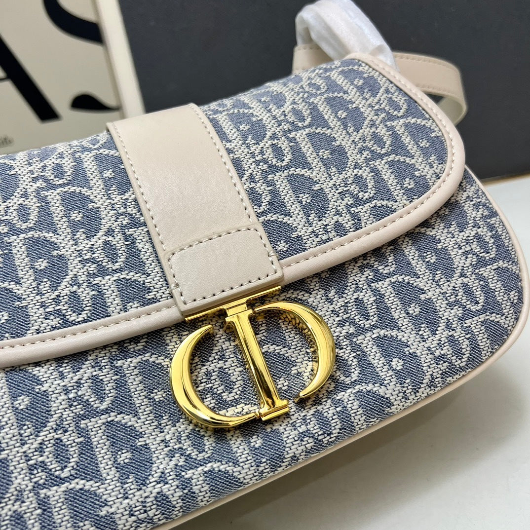 Christian  30 Montaigne Bag – Blue Oblique Jacquard Canvas with Gold-Finish CD Clasp