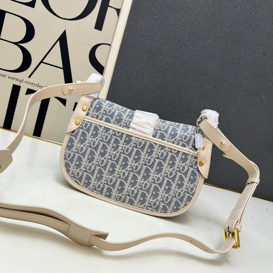 Christian  30 Montaigne Bag – Blue Oblique Jacquard Canvas with Gold-Finish CD Clasp