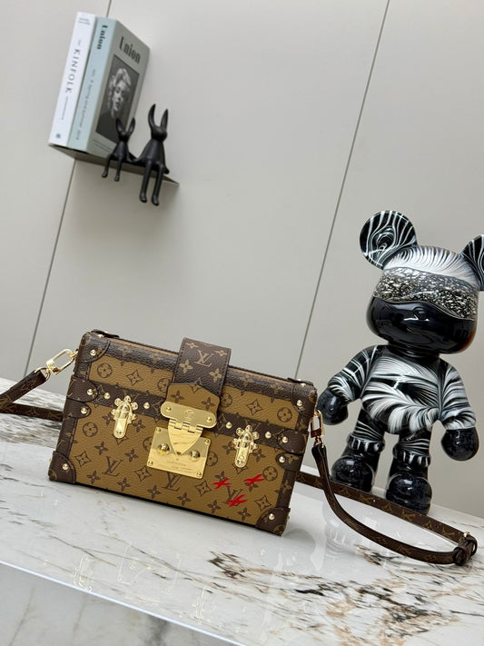 Petite Malle Monogram Canvas – Black Leather Trim with Gilded Hardware