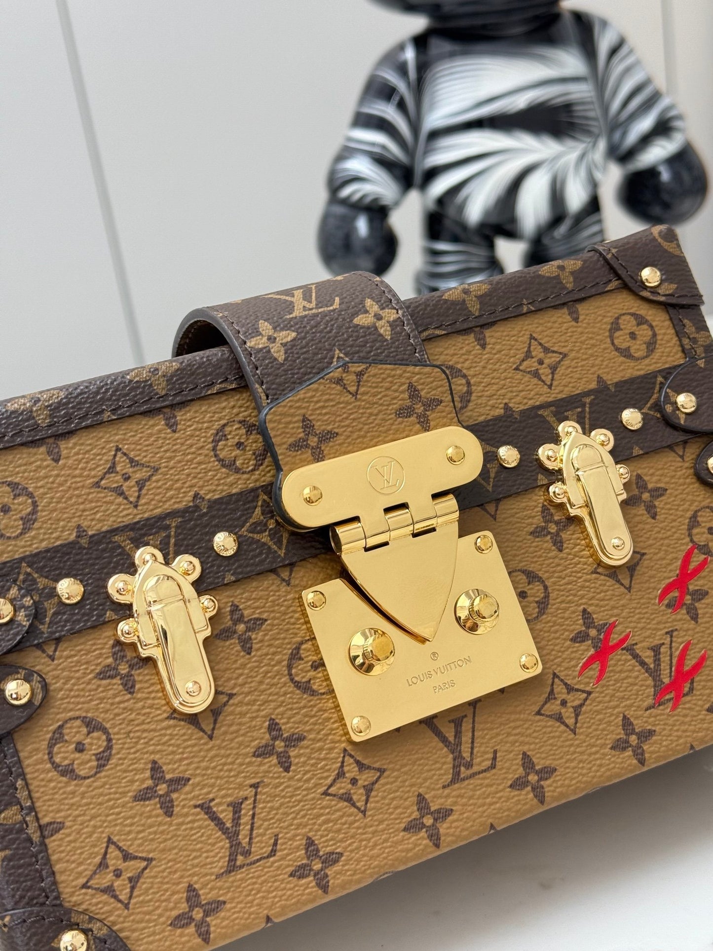 Petite Malle Monogram Canvas – Black Leather Trim with Gilded Hardware