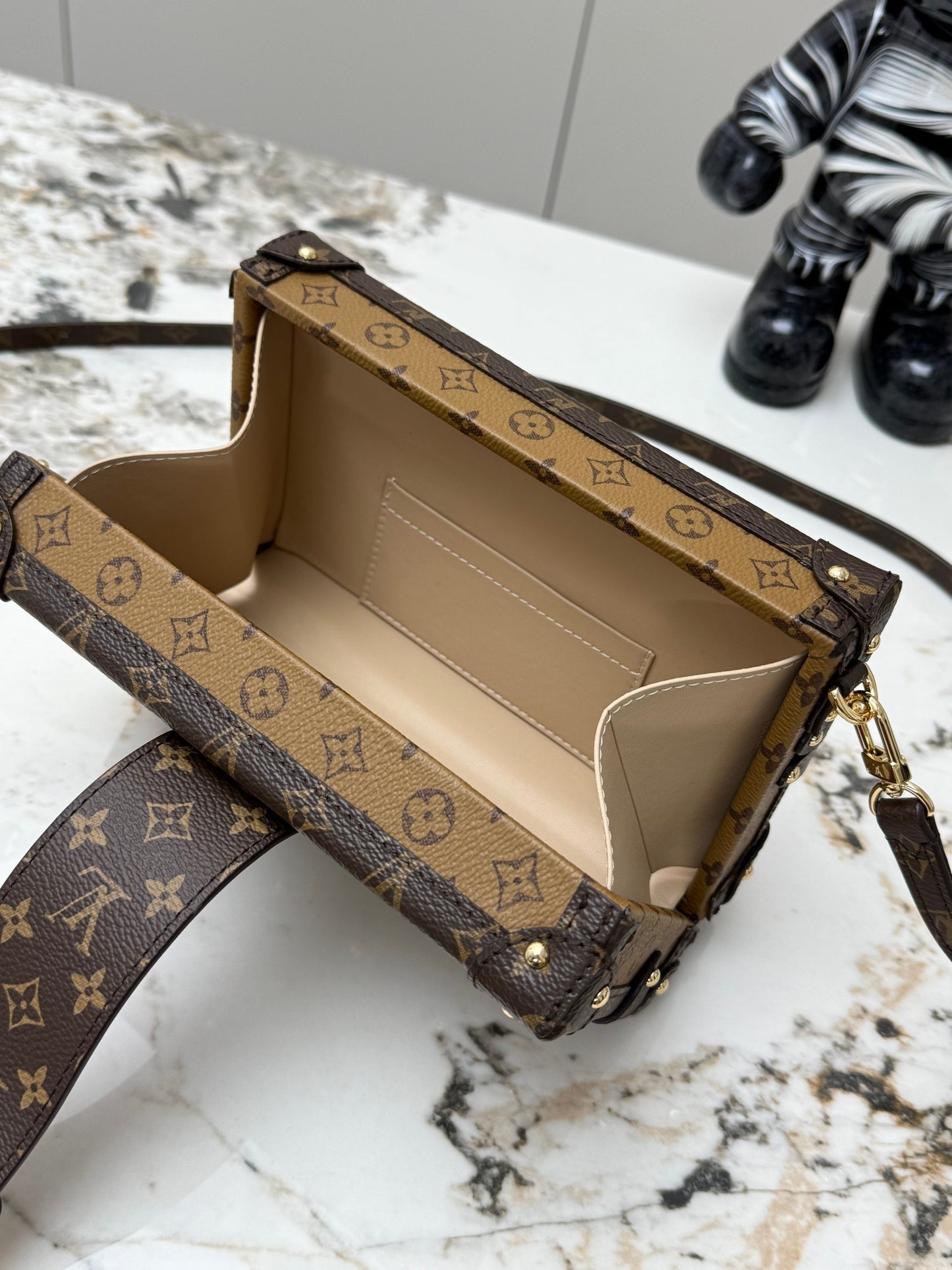 Petite Malle Monogram Canvas – Black Leather Trim with Gilded Hardware