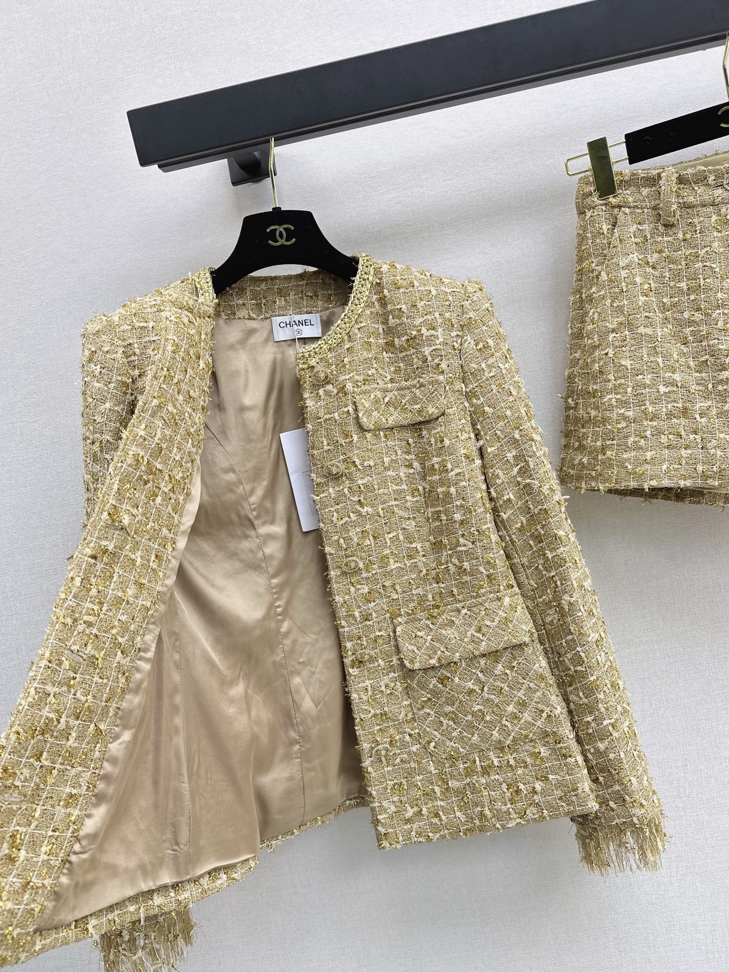 CC Metallic Gold Tweed Suit Set – Collarless Bouclé Jacket and High-Waisted Frayed Shorts