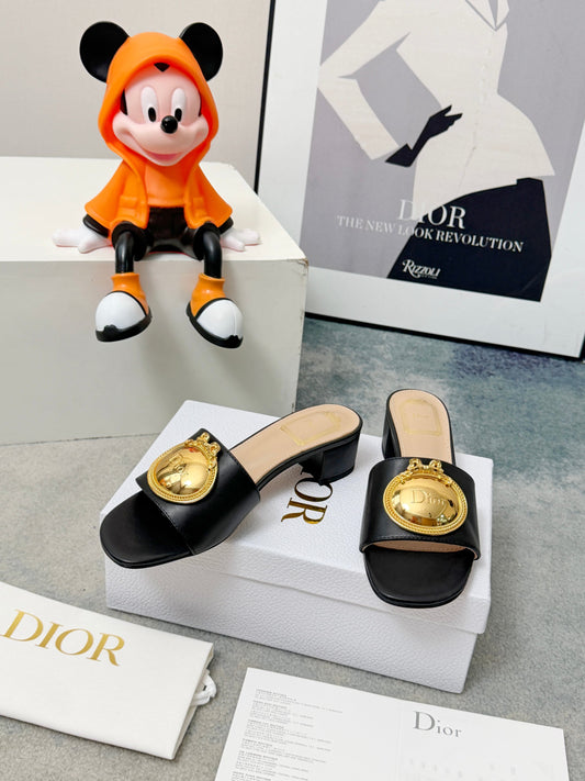 CD Heeled Mules – Smooth Black Lambskin Slide Sandals with Oversized Gold-Tone Medallion