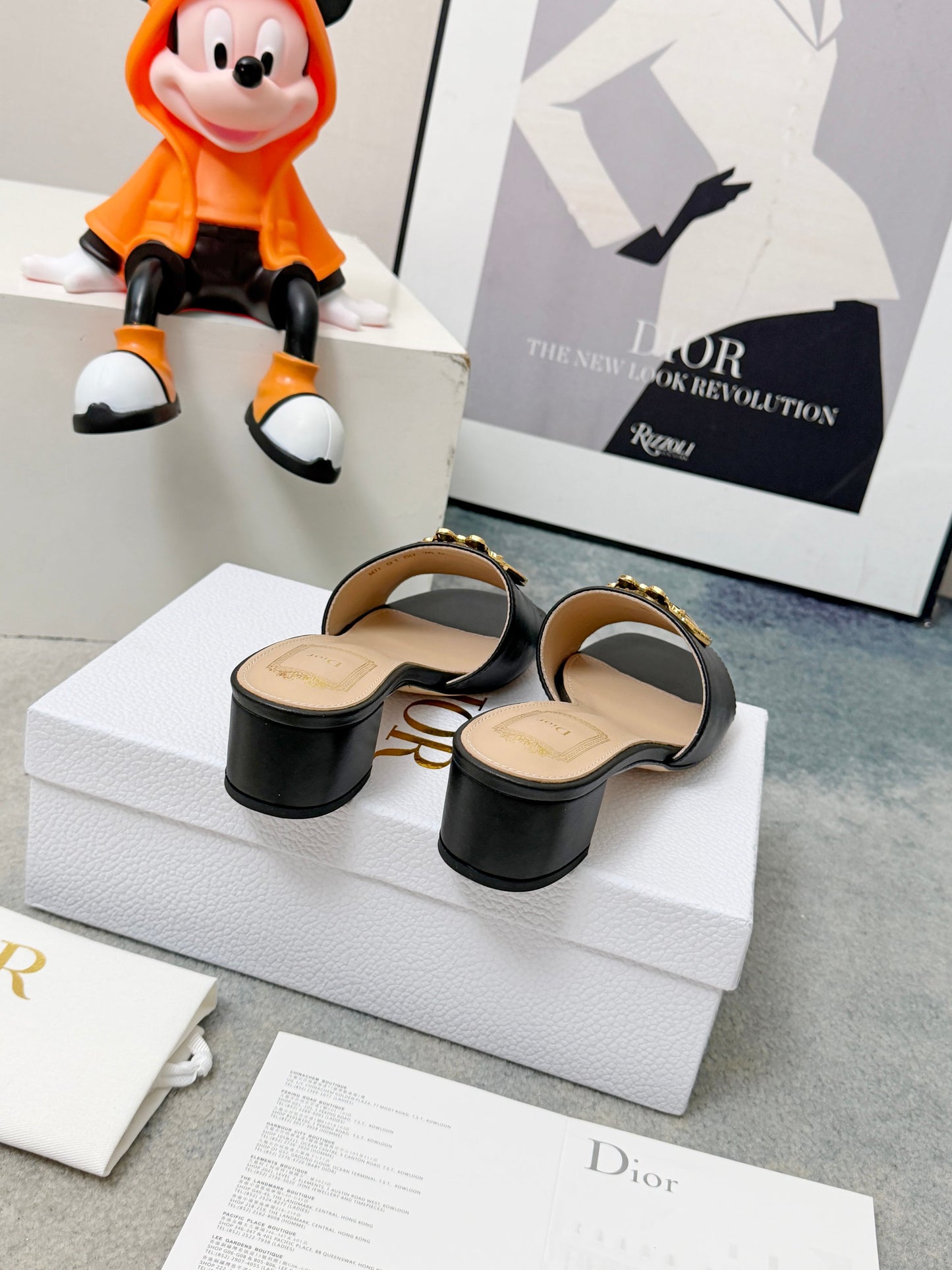CD Heeled Mules – Smooth Black Lambskin Slide Sandals with Oversized Gold-Tone Medallion