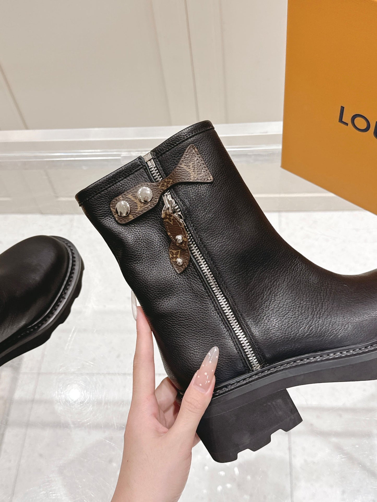 Louis Vuitton Territory Flat Ankle Boot – Black Grained Calfskin with Monogram Accents