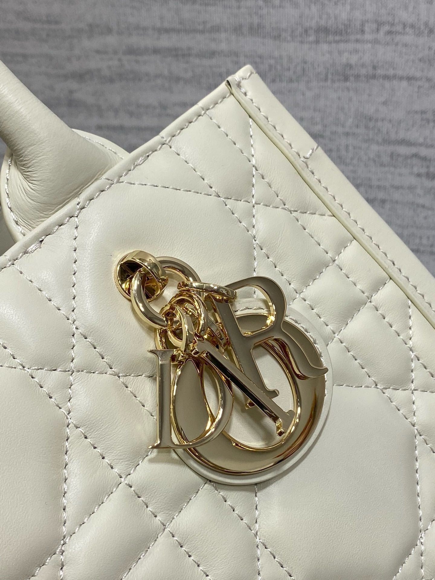 CD Micro Bag – Pristine Latte Off-White Quilted Leather Elongated East-West Clutch