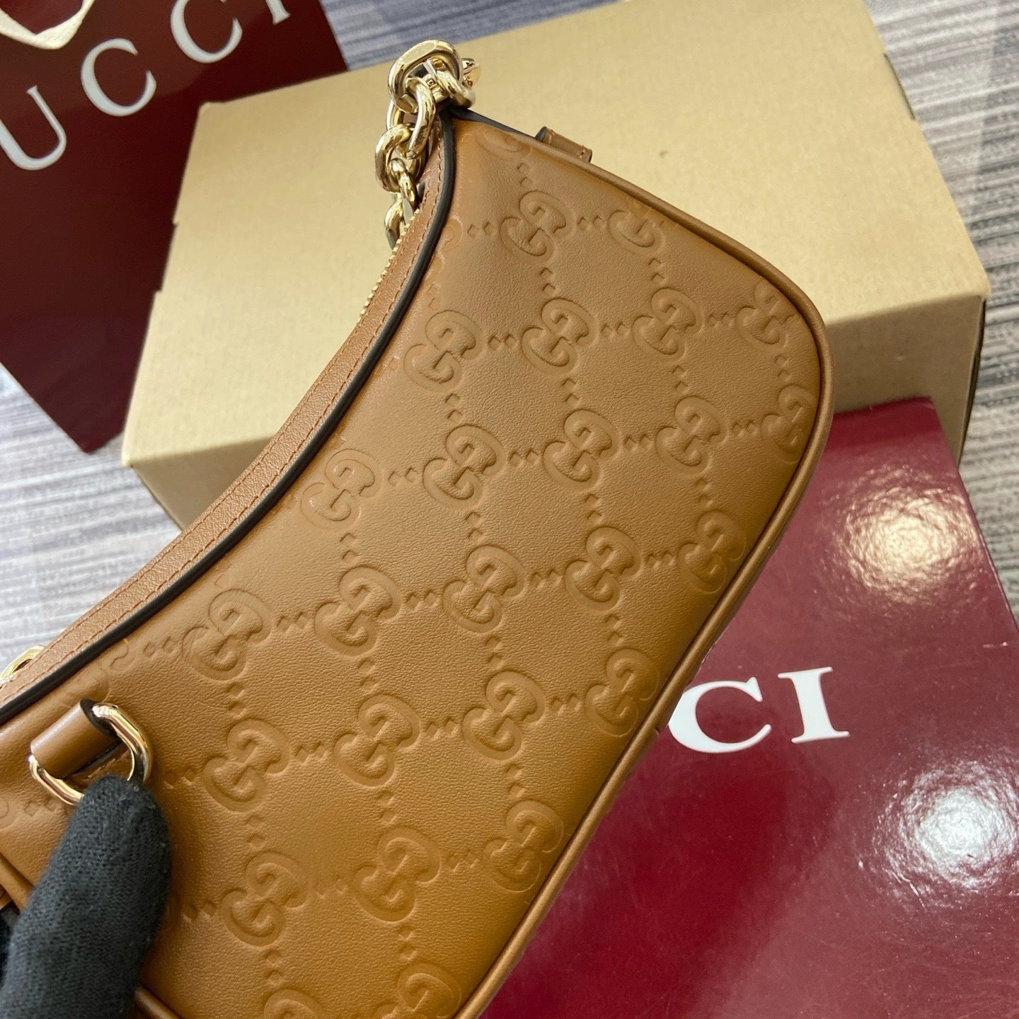 GG Signature Leather Mini Hobo Bag – Rich Cuir Brown Interlocking GG Debossed Guccissima Calfskin Shoulder Bag