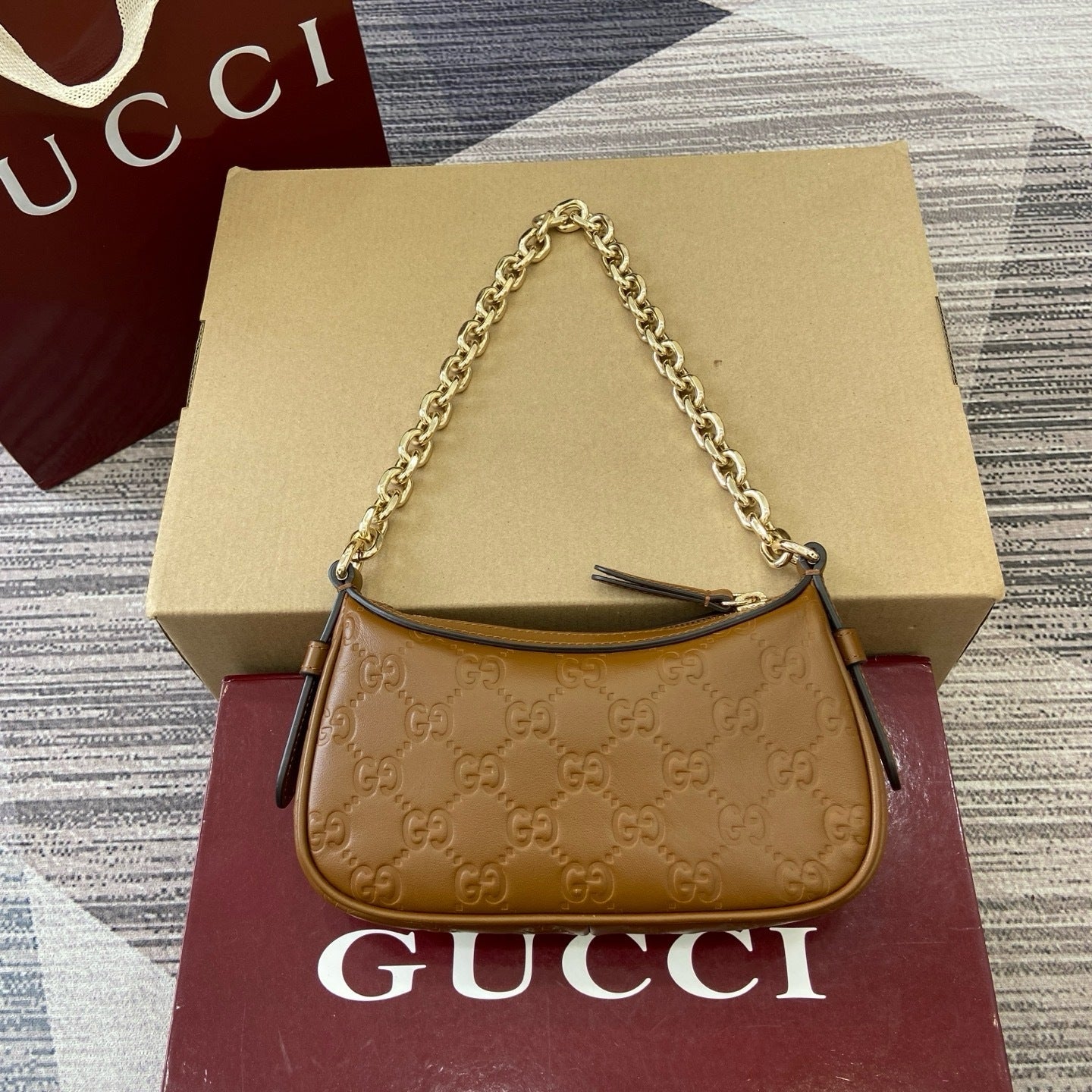 GG Signature Leather Mini Hobo Bag – Rich Cuir Brown Interlocking GG Debossed Guccissima Calfskin Shoulder Bag