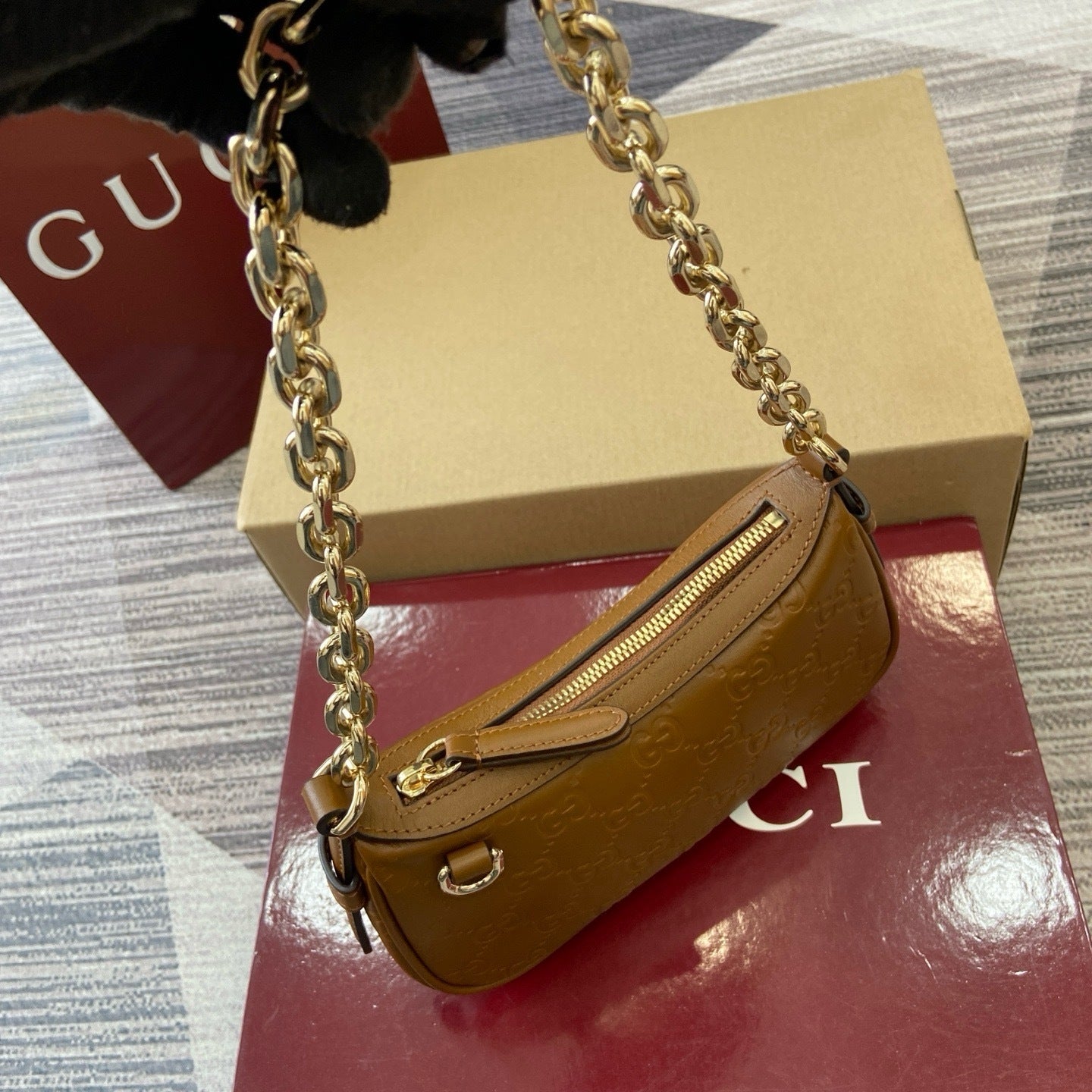 GG Signature Leather Mini Hobo Bag – Rich Cuir Brown Interlocking GG Debossed Guccissima Calfskin Shoulder Bag