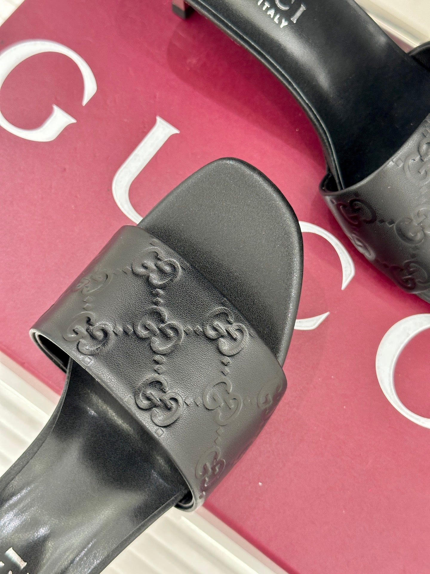 GG Leather Heeled Slide Sandals – Obsidian Onyx Monogram-Debossed Calfskin Open-Toe Mules