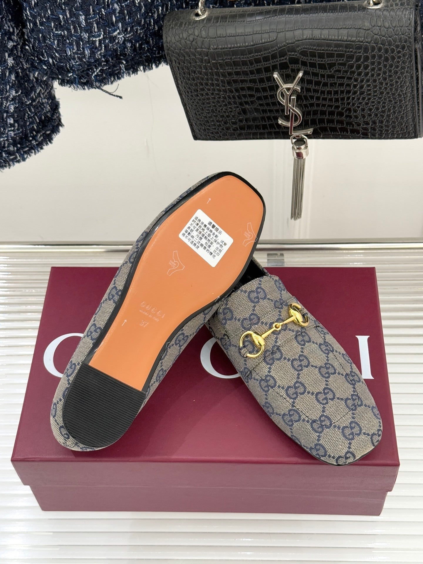 Gucci Jordaan Loafer – Blue & Ebony GG Supreme Canvas with Gold-Tone Horsebit