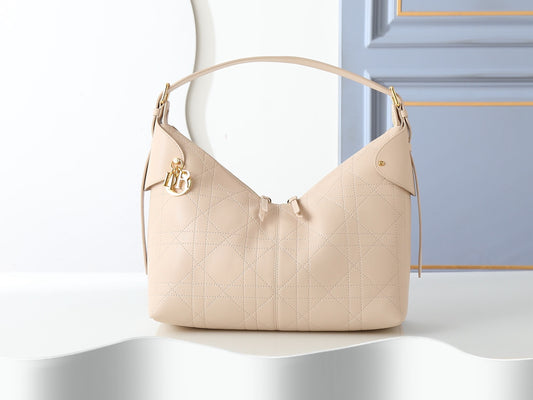 CD Voyage Bag – Powder Beige Flat Macrocannage Grained Calfskin