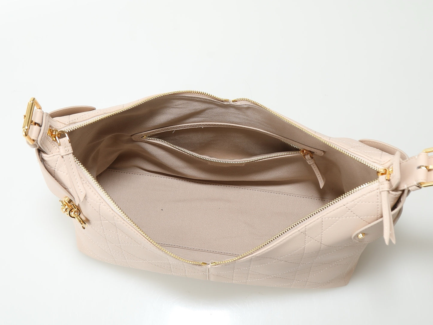 CD Voyage Bag – Powder Beige Flat Macrocannage Grained Calfskin