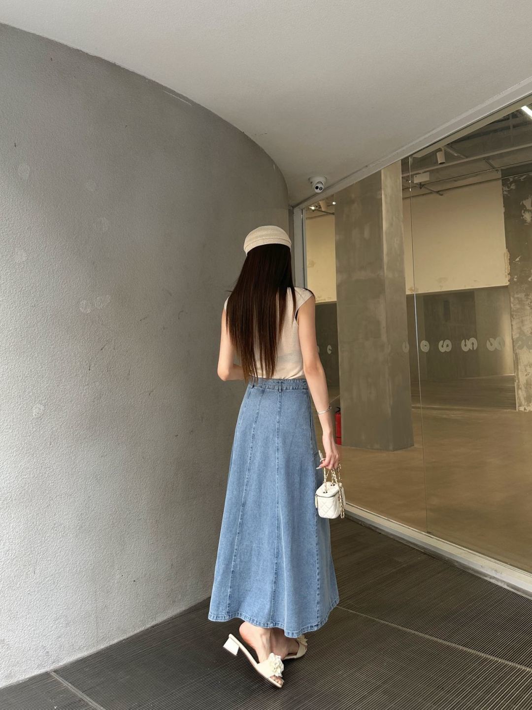 Anagram Embroidered Denim Midi Skirt – Deep Indigo Dark-Blue Structured Cotton Denim High-Rise Flared A-Line Skirt
