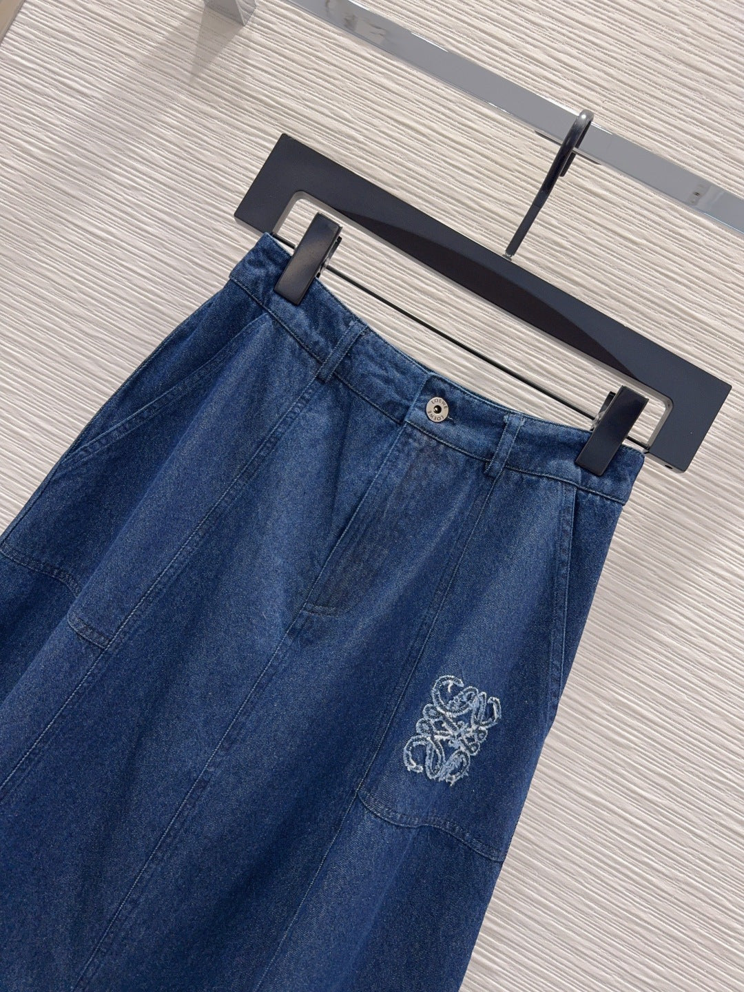 Anagram Embroidered Denim Midi Skirt – Deep Indigo Dark-Blue Structured Cotton Denim High-Rise Flared A-Line Skirt