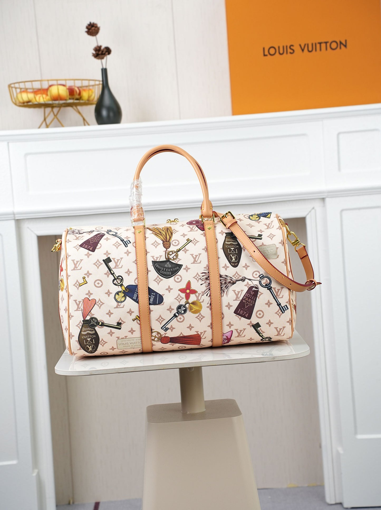 LV Flight Mode Keepall Bandoulière 45 – Monogram Dune Canvas with Vintage Key Motif