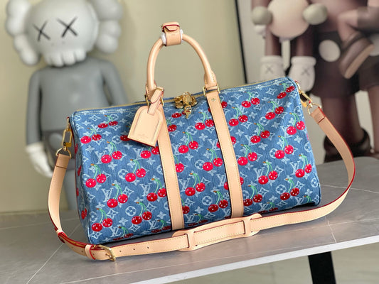 LV Keepall Bandoulière 50– Vintage Stone-Washed Blue Monogram Denim Travel Duffel