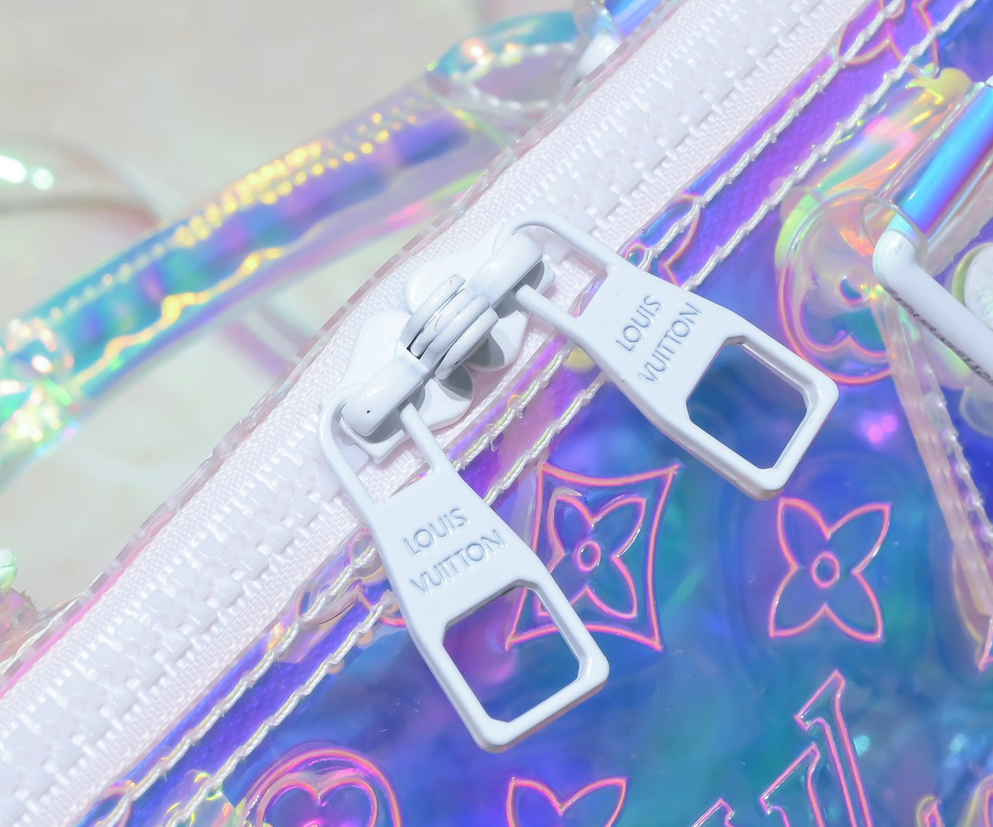 Louis Vuitton Monogram Prism Keepall Bandouliere 50 – Holographic PVC with Clear Resin Chain