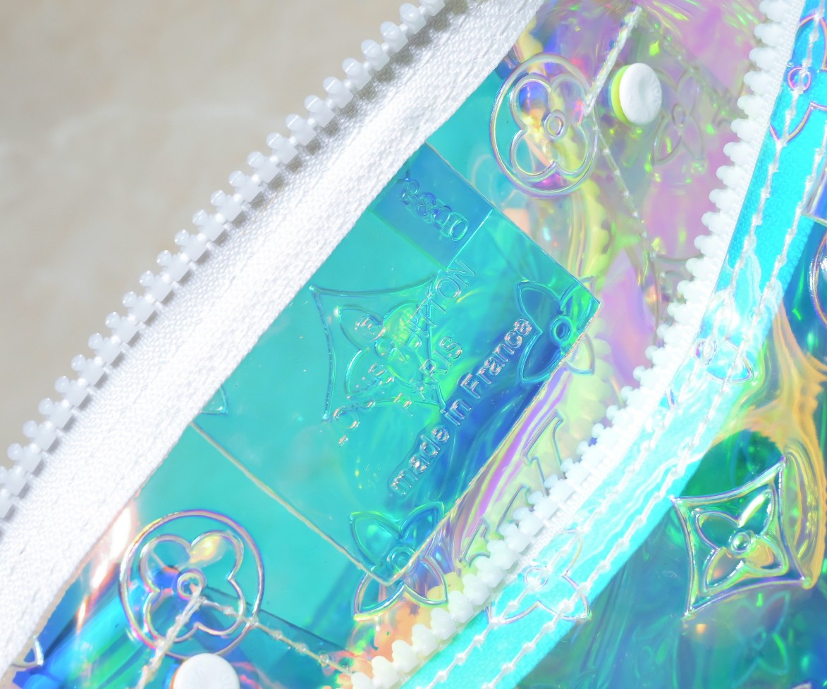 Louis Vuitton Monogram Prism Keepall Bandouliere 50 – Holographic PVC with Clear Resin Chain