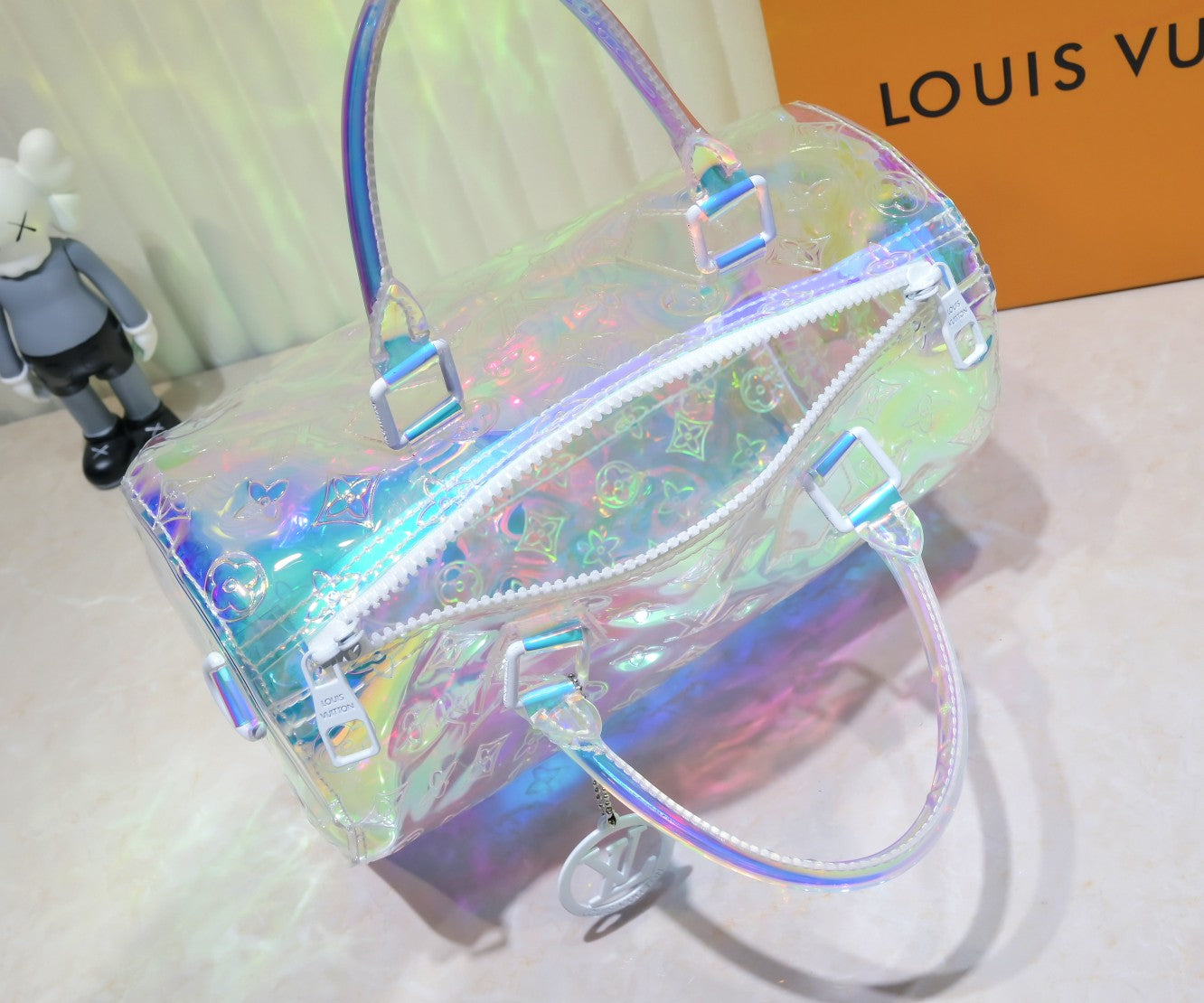 Louis Vuitton Monogram Prism Keepall Bandouliere 50 – Holographic PVC with Clear Resin Chain