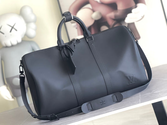 LV Keepall Bandoulière 50 – Midnight Black Taurillon Pebbled Leather Travel Duffel