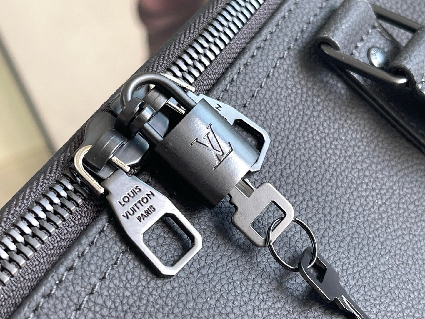 LV Keepall Bandoulière 50 – Midnight Black Taurillon Pebbled Leather Travel Duffel