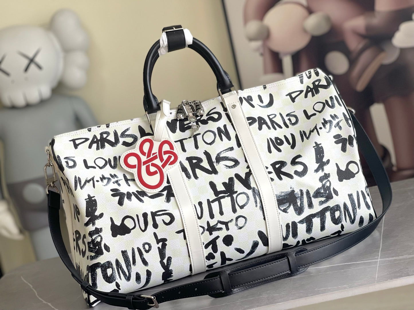 LV Keepall Bandoulière Optic White Coated Canvas Weekender with Ink-Black Brushstroke Typography