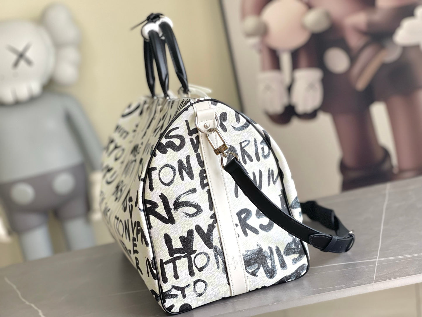 LV Keepall Bandoulière Optic White Coated Canvas Weekender with Ink-Black Brushstroke Typography