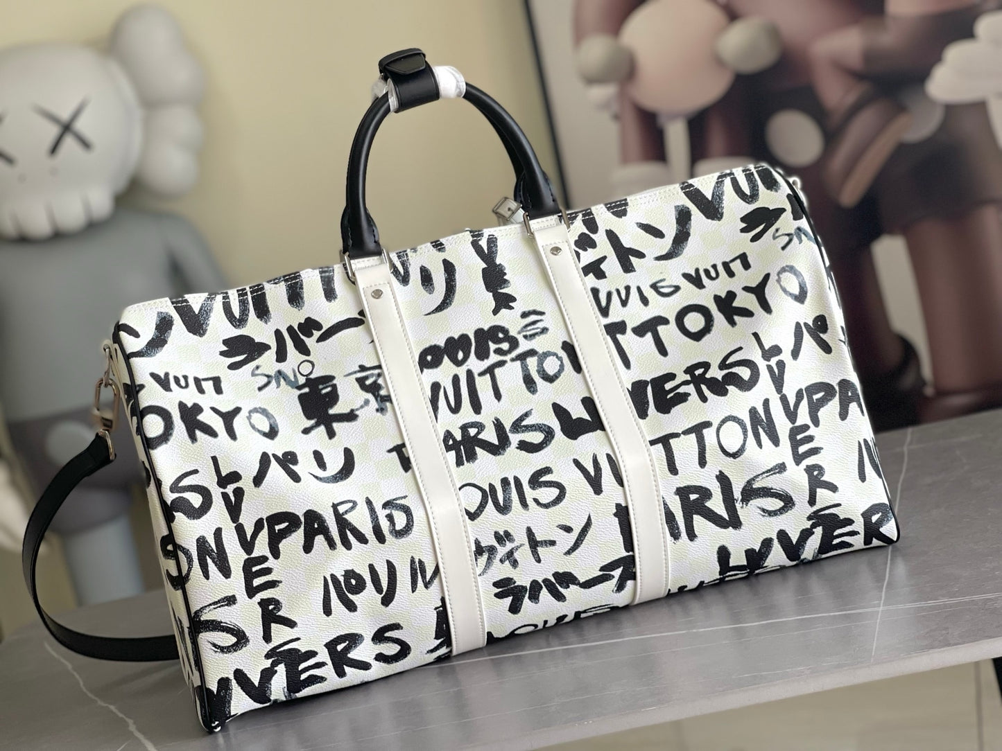 LV Keepall Bandoulière Optic White Coated Canvas Weekender with Ink-Black Brushstroke Typography
