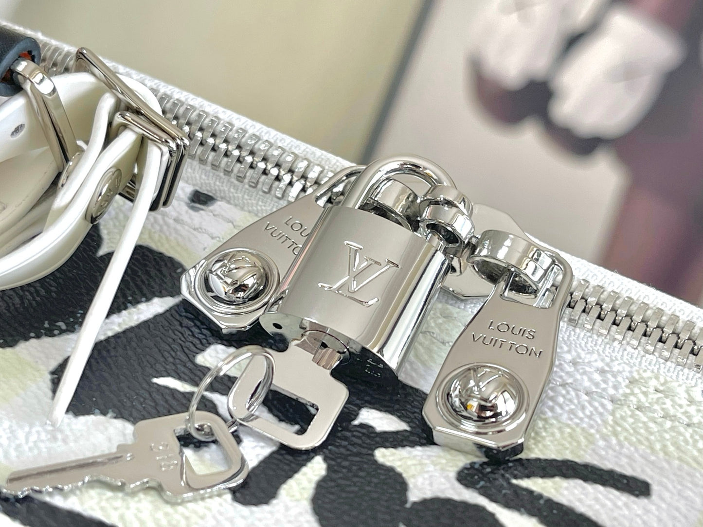LV Keepall Bandoulière Optic White Coated Canvas Weekender with Ink-Black Brushstroke Typography