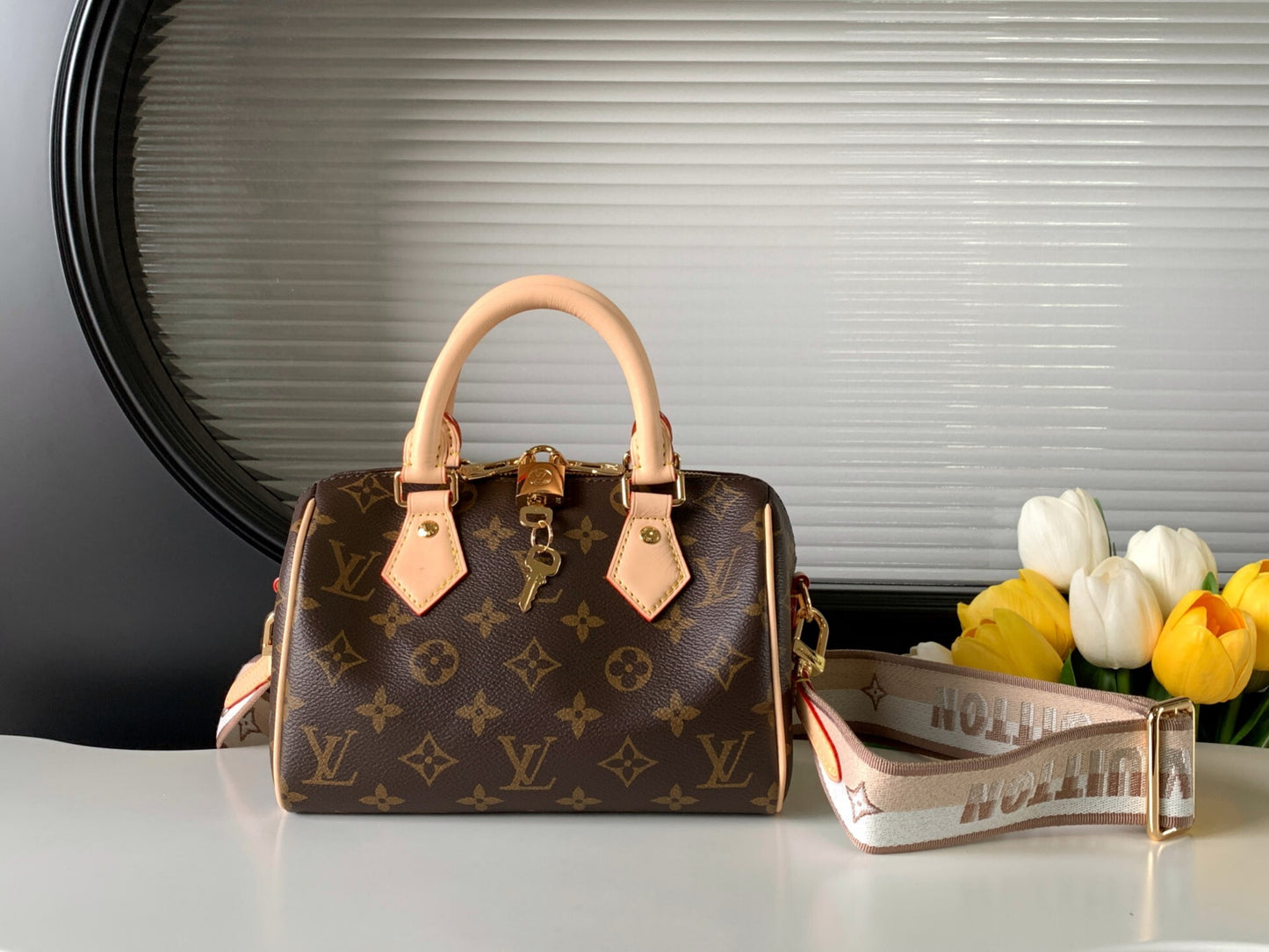 LV Speedy Bandoulière 20 – Classic Monogram Coated Canvas Micro Duffle Bag