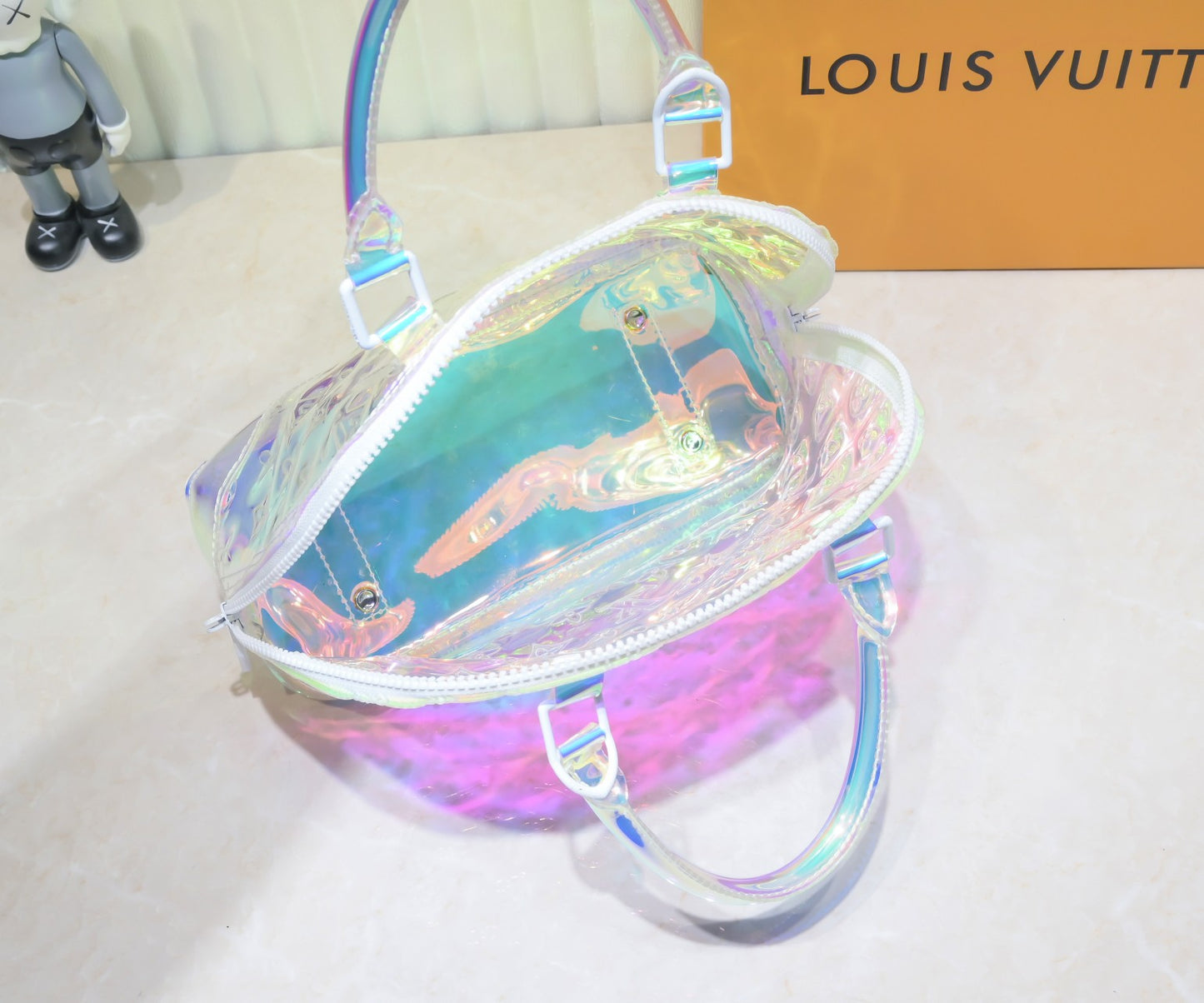 LV Monogram Prism Alma BB – Iridescent Monogram PVC with Matte White Hardware