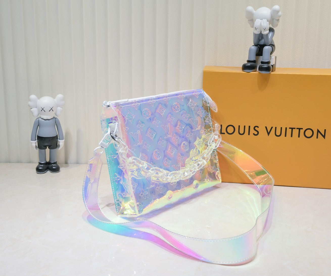 LV Monogram Prism Soft Trunk – Iridescent PVC with Sculptural Acetate Chain