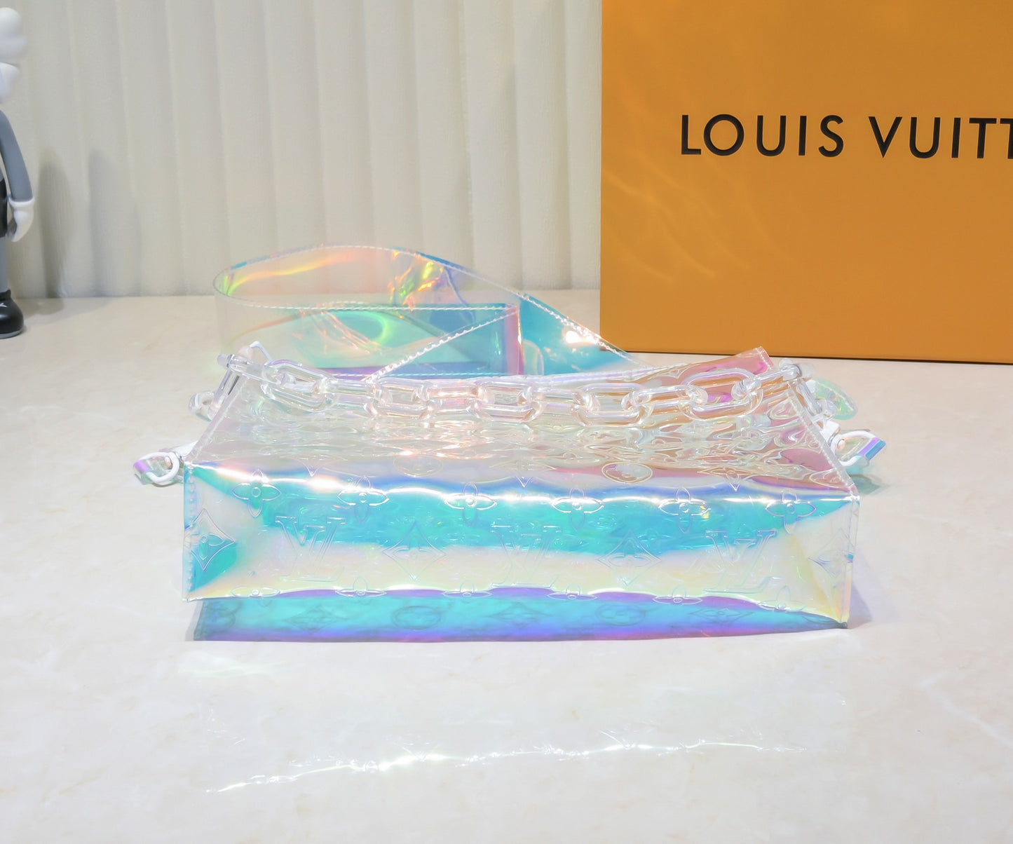 LV Monogram Prism Soft Trunk – Iridescent PVC with Sculptural Acetate Chain