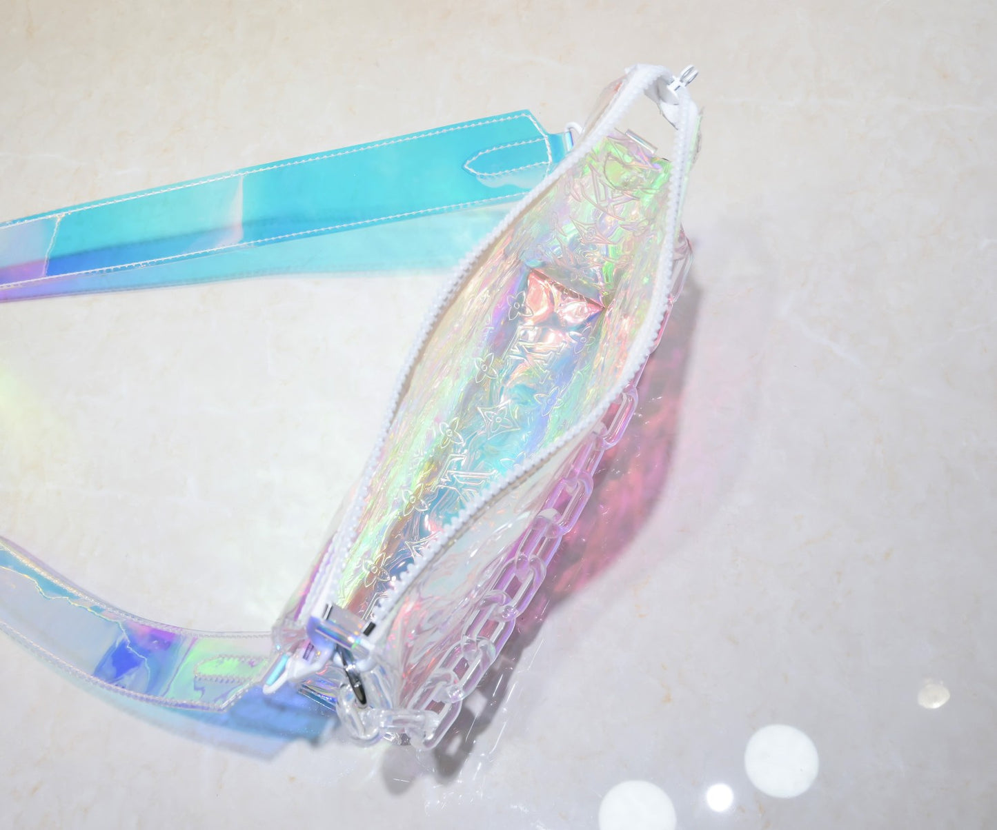 LV Monogram Prism Soft Trunk – Iridescent PVC with Sculptural Acetate Chain