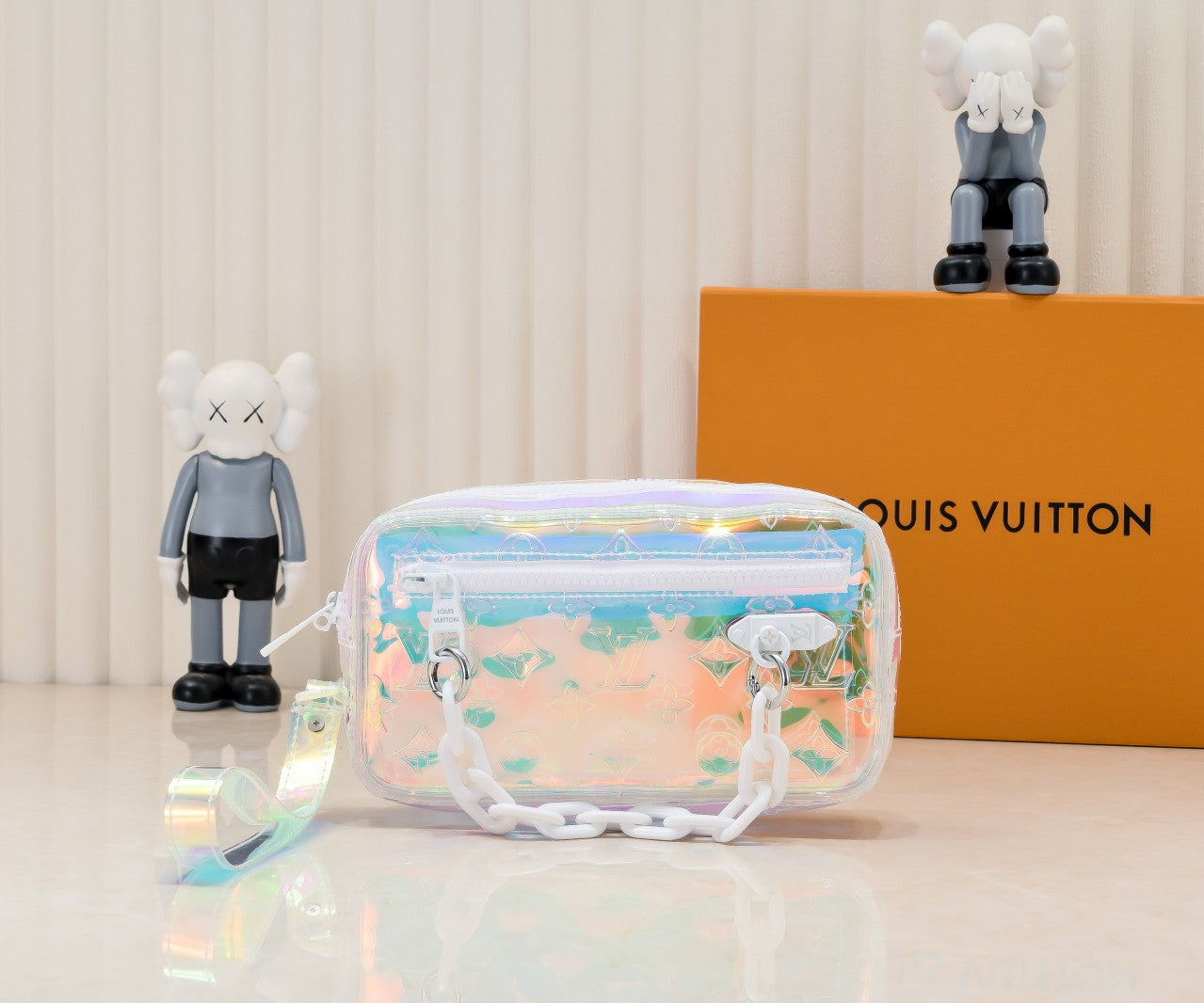 LV Monogram Prism Pochette Volga – Iridescent PVC with Matte White Resin Chain