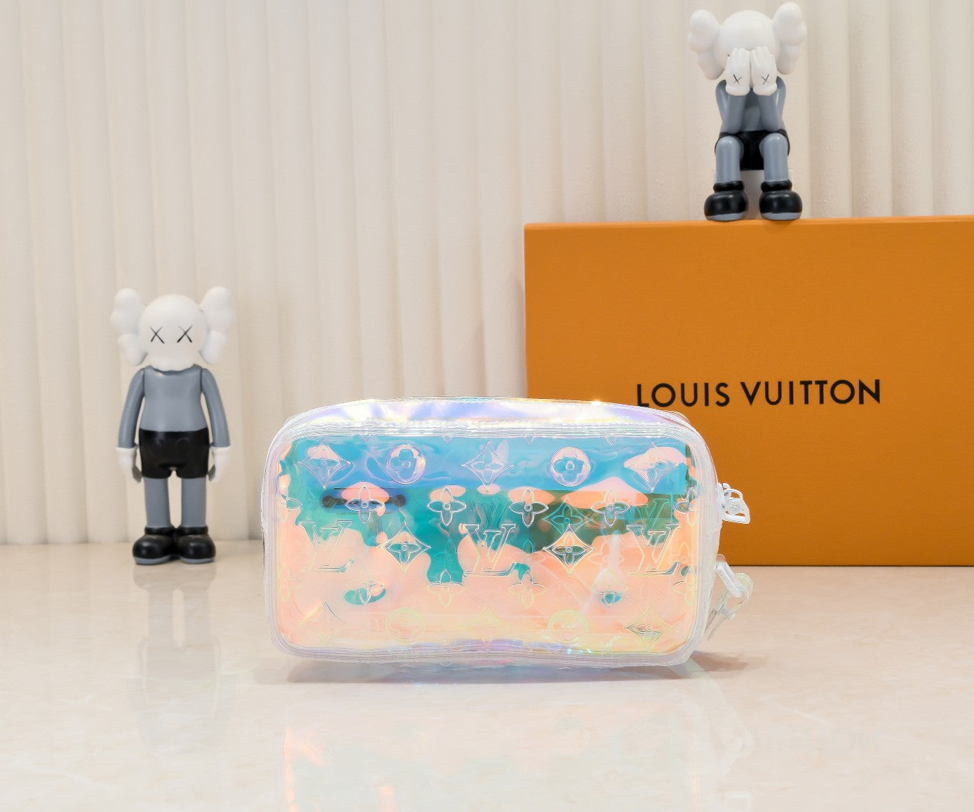 LV Monogram Prism Pochette Volga – Iridescent PVC with Matte White Resin Chain