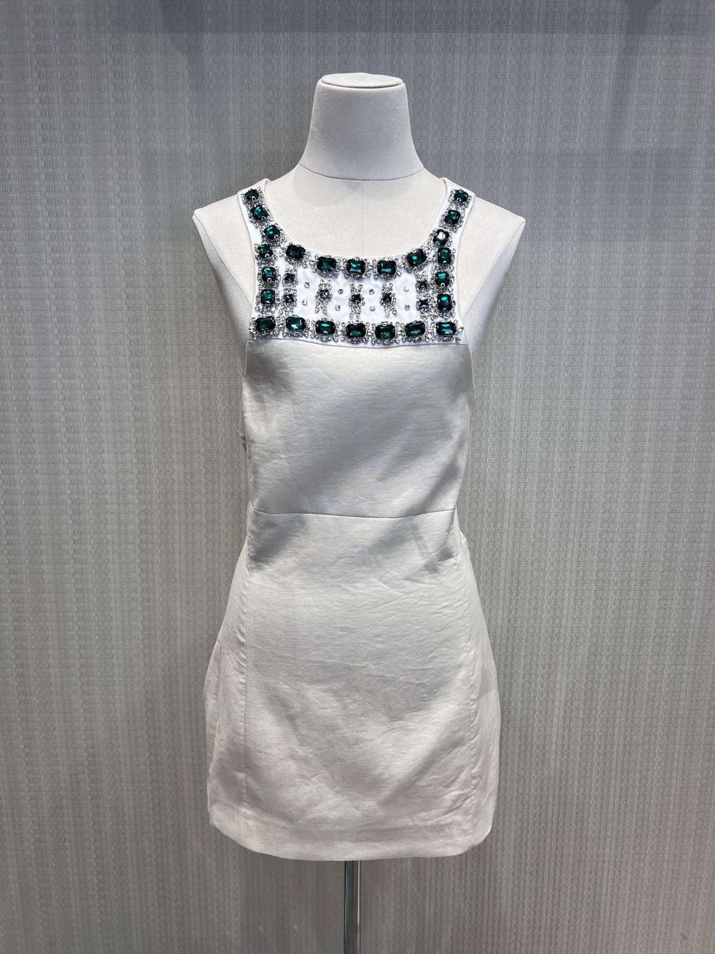 Miu Miu Embellished Canvas Apron Dress – Alabaster Ecru Structured Cotton-Linen Mini with Emerald Crystals