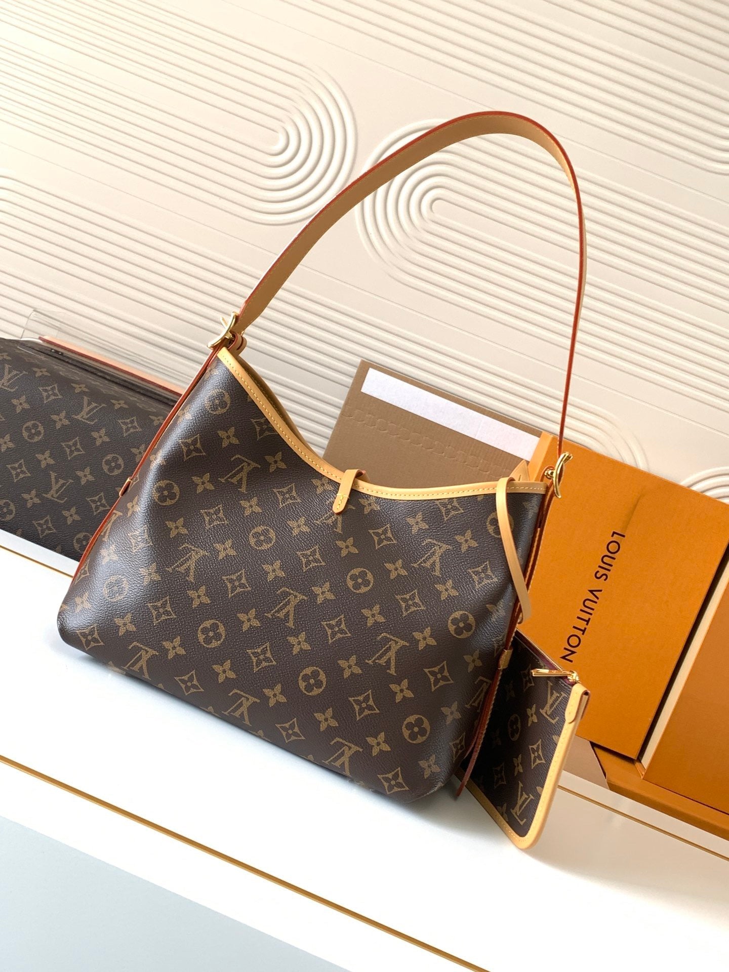 CarryAll PM Monogram Canvas – Classic Handbag with Detachable Pouch