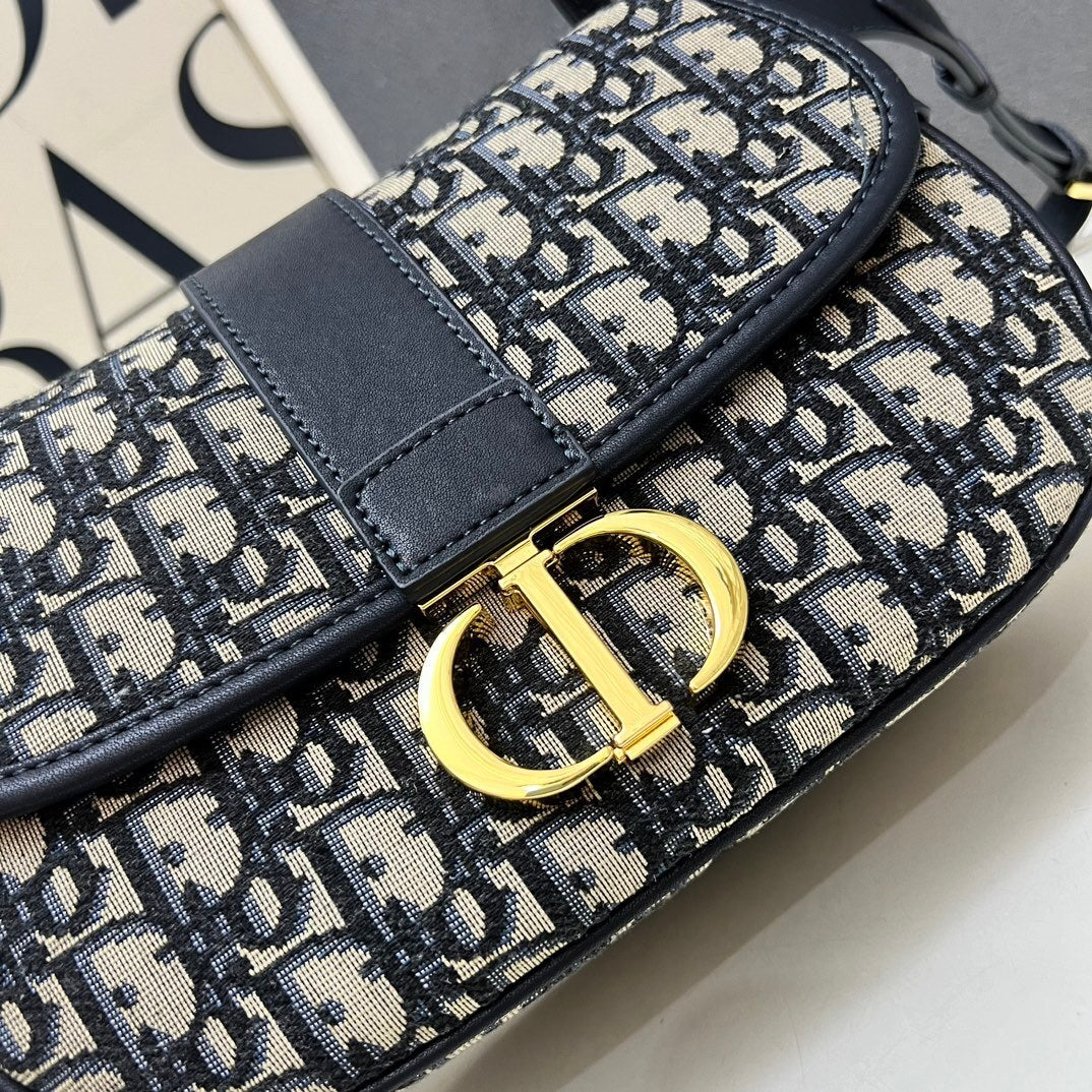 Montaigne Bag 25cm – Blue Oblique Jacquard with Antique Gold CD Clasp