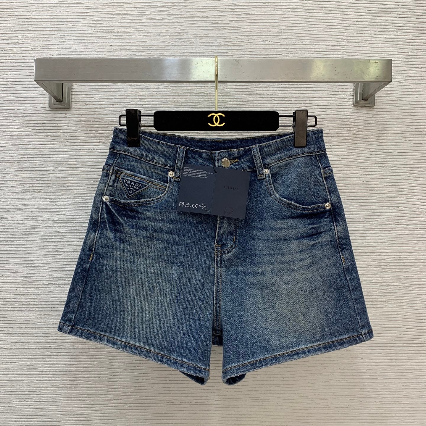 Denim Shorts – Vintage Indigo Stone-Washed Rigid Cotton Denim High-Rise Shorts with Enameled Metal Plaque