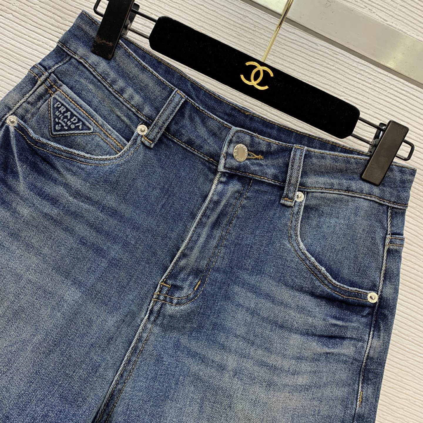 Denim Shorts – Vintage Indigo Stone-Washed Rigid Cotton Denim High-Rise Shorts with Enameled Metal Plaque