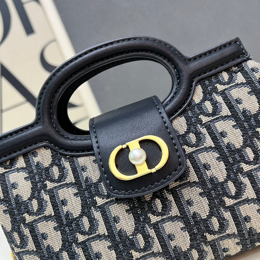 Christian Bobby East-West Bag – Blue Oblique Jacquard Canvas with Gold-Tone CD Buckle