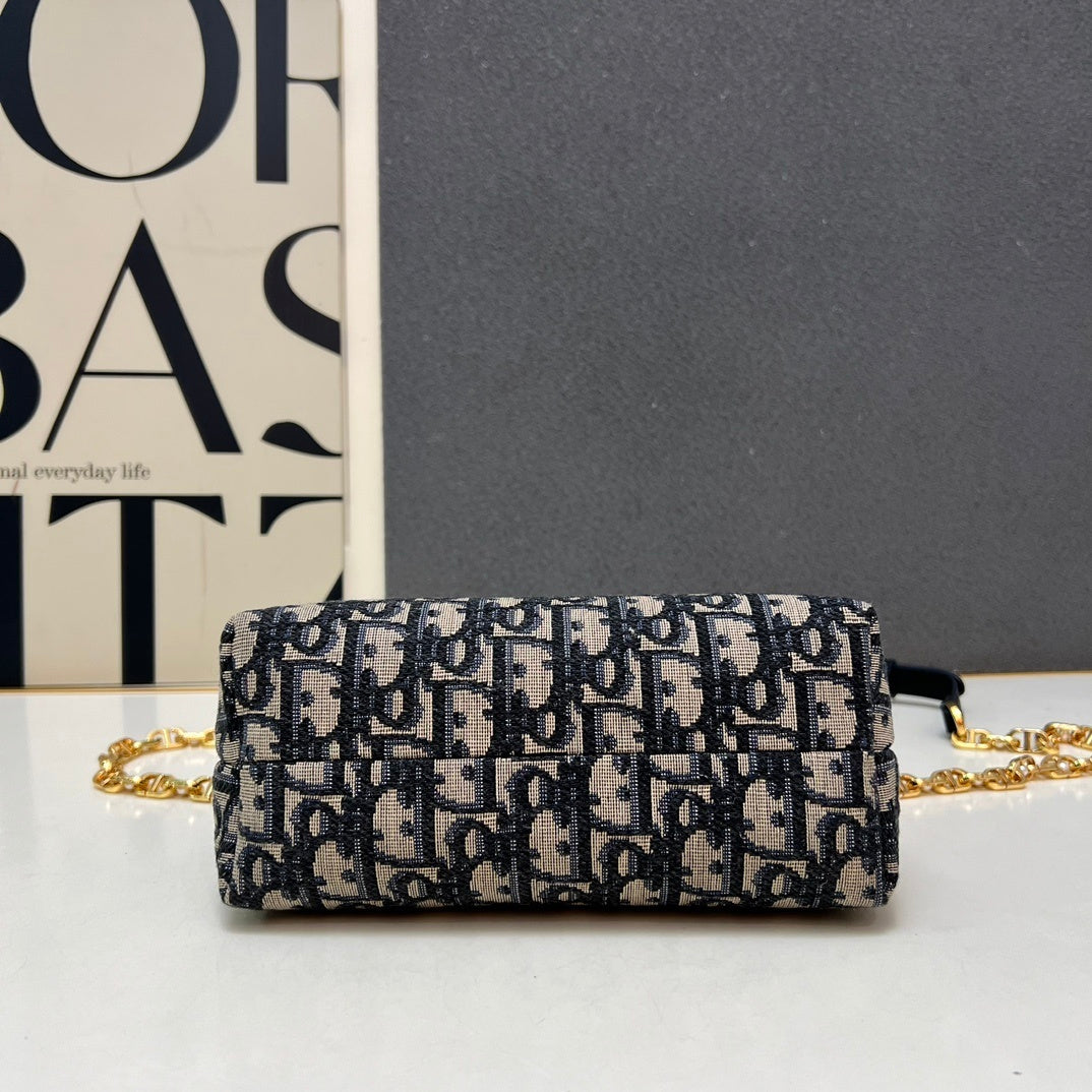 Christian Bobby East-West Bag – Blue Oblique Jacquard Canvas with Gold-Tone CD Buckle
