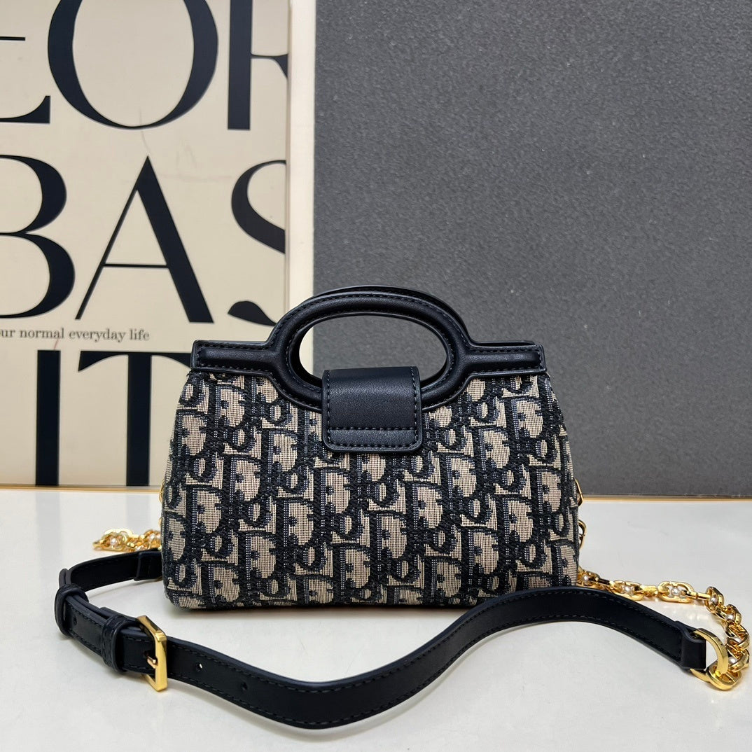 Christian Bobby East-West Bag – Blue Oblique Jacquard Canvas with Gold-Tone CD Buckle