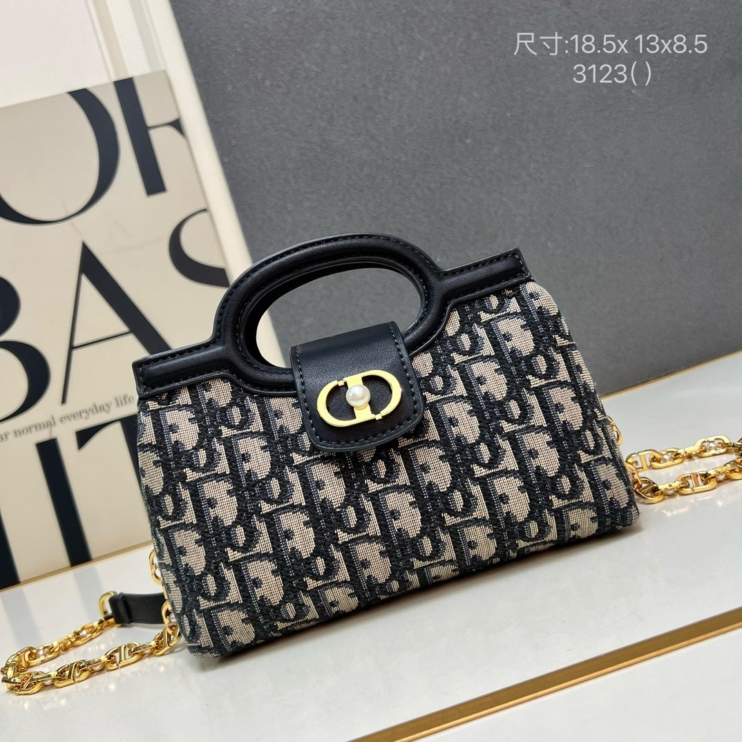 Christian Bobby East-West Bag – Blue Oblique Jacquard Canvas with Gold-Tone CD Buckle